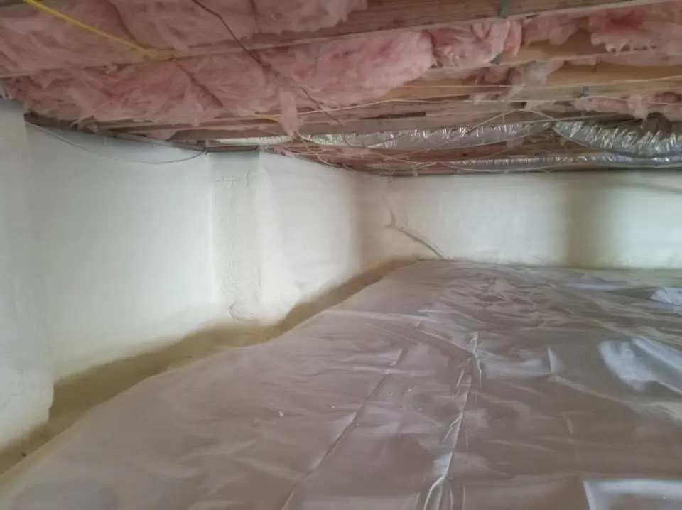 Crawl space encapsulation with closed-cell spray foam for Storm Damage Roof Repair in Belchertown